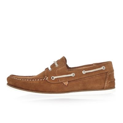 Tan suede boat shoes
